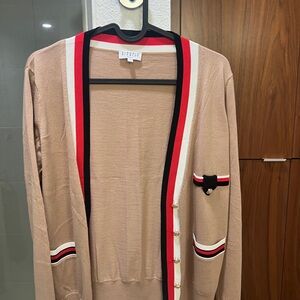 Beige Cardigan with Red and Black Accents
